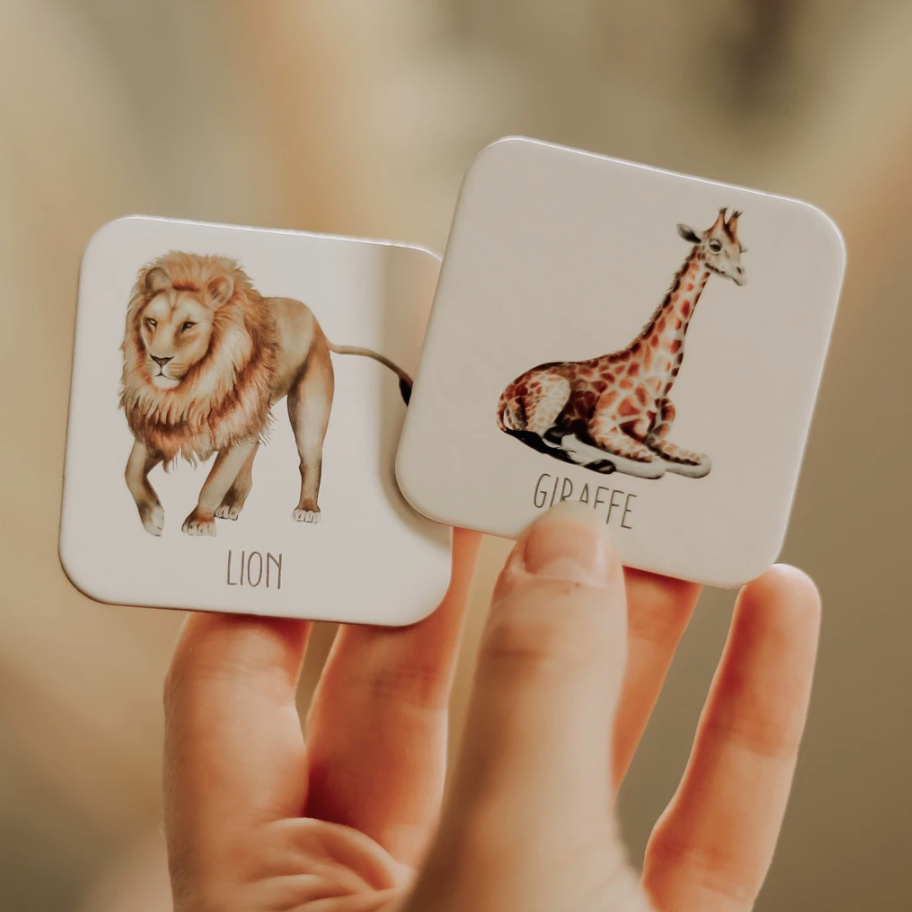 Lion and giraffe memory cards made from recycled cardstock.
